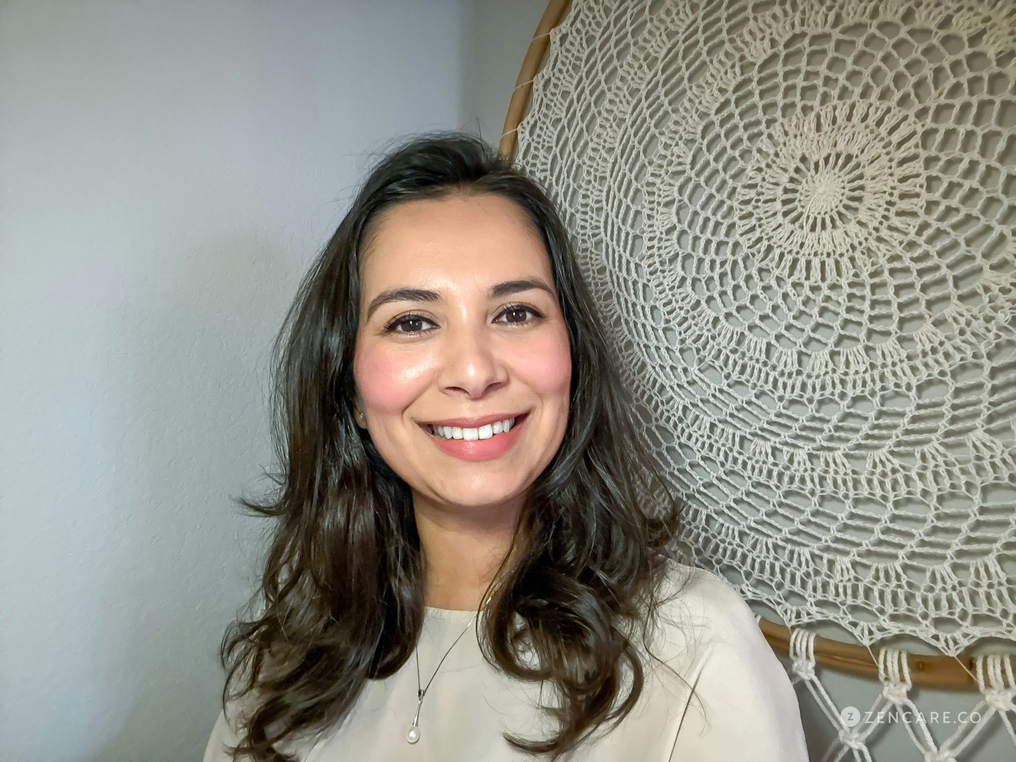 Irma Guerrero-Ali, dreamcatcher behind her